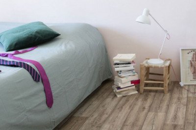 Want to create a modern vibe in your living room? Buy Vinyl Flooring!